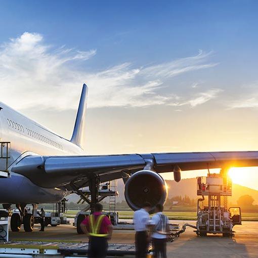 photo of loading cargo onto airplane